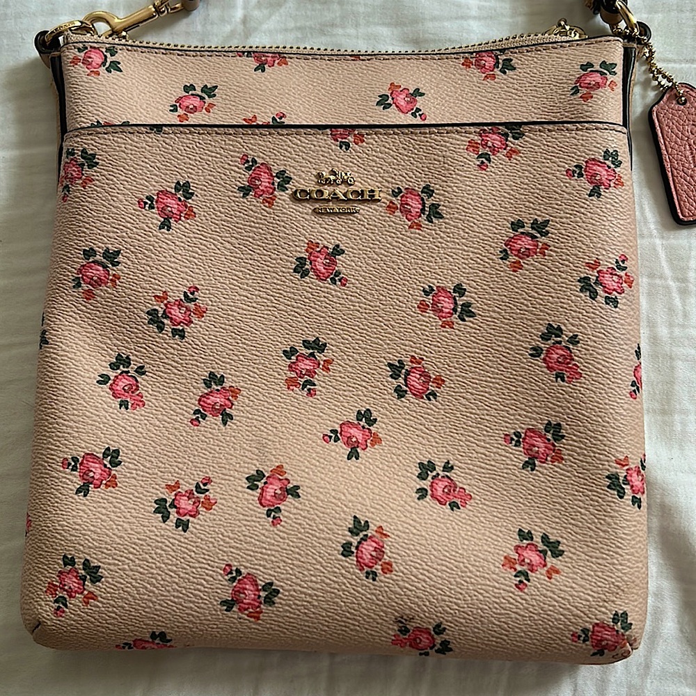 Authentic coach crossbody. Beautiful baby pink with rosettes.